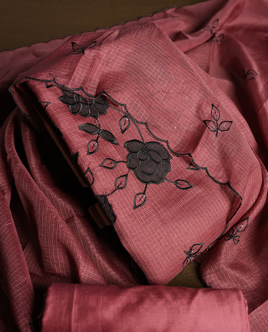 Pink colour churidhar material featuring Black colour thread embroidery on the front panel, self colour dupatta with elegant border, and matching plain bottom