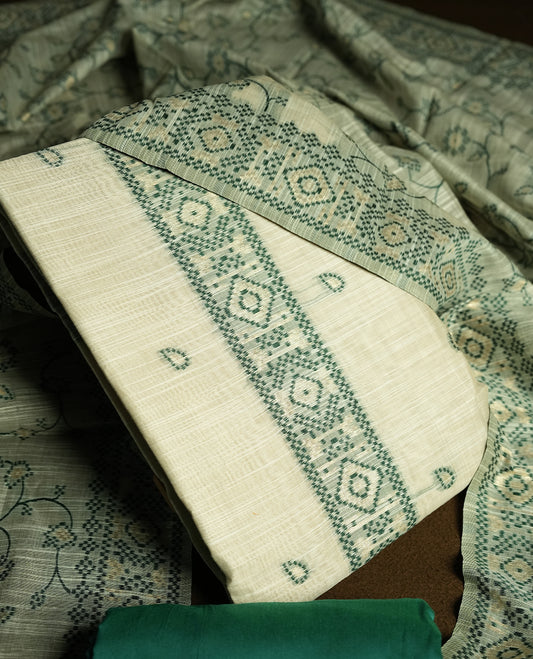 Cream colour churidhar material featuring Green colour thread embroidery on the front panel, floral thread pattern dupatta with elegant border, and matching plain bottom.
