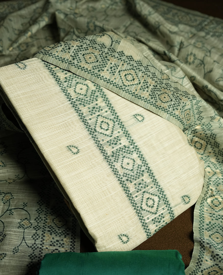 Cream colour churidhar material featuring Green colour thread embroidery on the front panel, floral thread pattern dupatta with elegant border, and matching plain bottom.