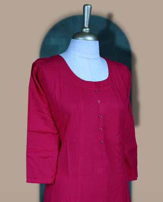 Deep Magenta colour cotton kurthi with front buttons, 3/4th sleeves, and a round neckline & Perfect for daily wear, office, or layering, Soft, breathable fabric ensures all day comfort and ease.