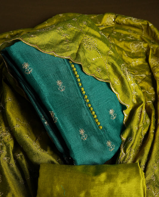 Green colour churidhar material featuring thread embroidery on the front panel, contrast Olive colour dupatta with elegant border, and matching plain bottom