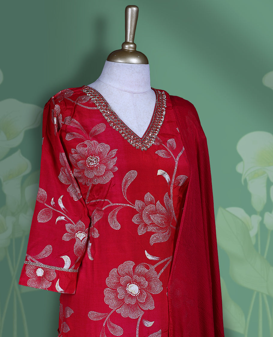 Rani pink colour churidar set featuring elegant white thread & cut beat embroidery on the neckline, sleeves, and gold floral pattern across the body, Paired with a matching plain dupatta