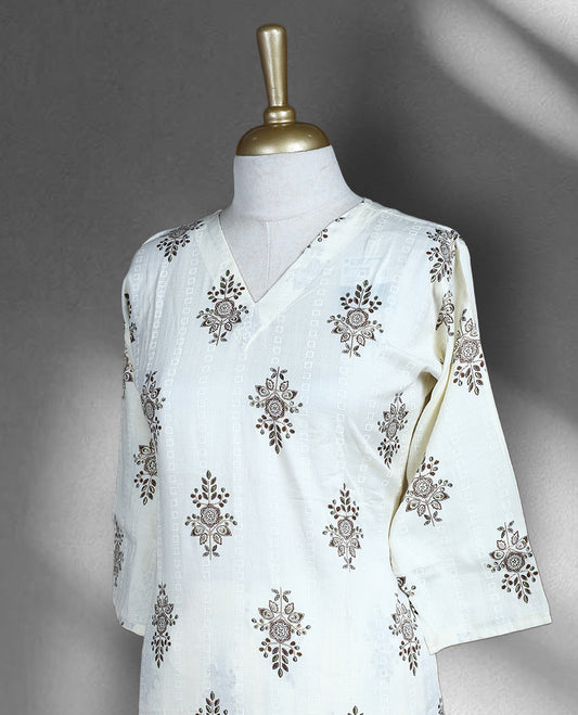 Off white colour Cord set with brown and green floral block print, featuring a V neck top with a straight cut silhouette and side slits, paired with matching straight fit pants.
