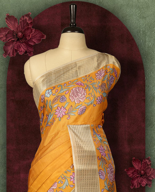 Mustard yellow colour Semi Tussar Silk saree with vibrant digital floral printed body and elegant Kandha work border & Paired with a matching blouse.