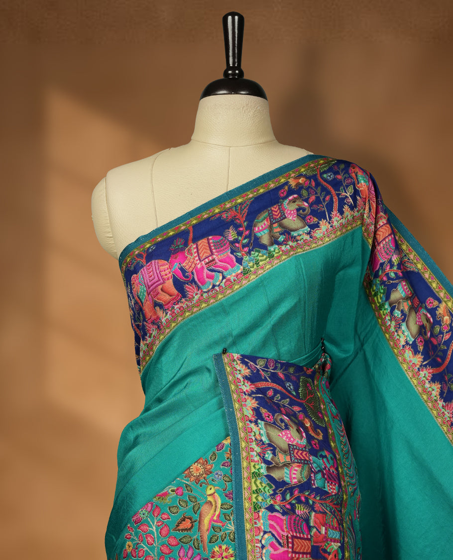 Teal Colour Pashmina Silk Saree with Vibrant Embroidered Elephants, Peacocks, and Floral Motifs, Intricate Zari Border, and Pallu paired with Matching Blouse