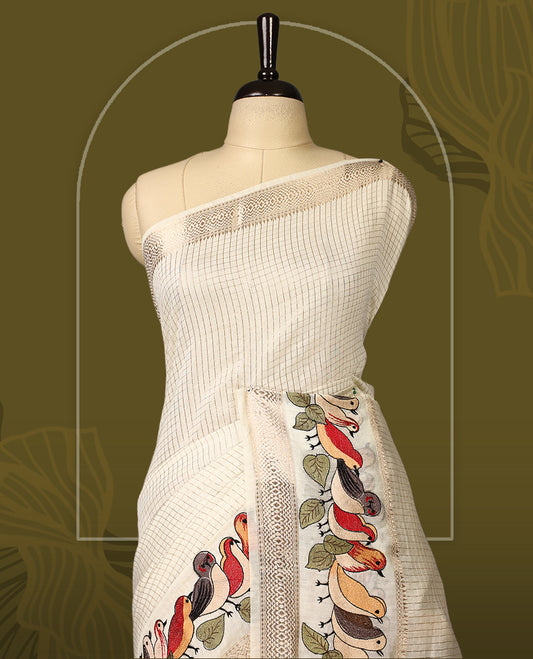 Off White viscose saree featuring subtle checkered patterns and a beautifully embroidered bird motif border, paired with a rich pallu & perfect for festive occasions, celebrations, and elegant gatherings.