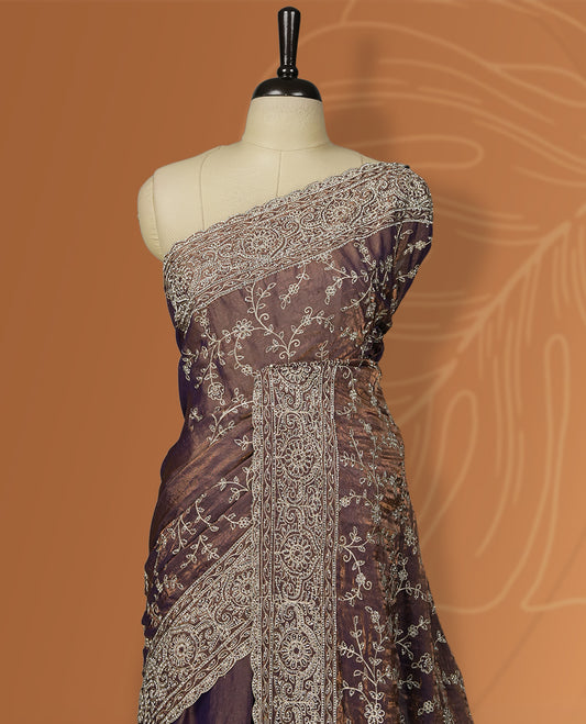Purple & Brown colour velvet chiffon designer saree in elegant two tone shades, featuring light gold zari, kodi work with handwoven style thread aari & dori embroidery work, Swarovski stone work and all over motifs, comes with matching blouse.
