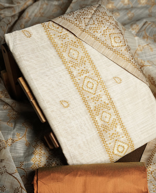 Cream colour churidhar material featuring Gold colour thread embroidery on the front panel, floral thread pattern dupatta with elegant border, and matching plain bottom.