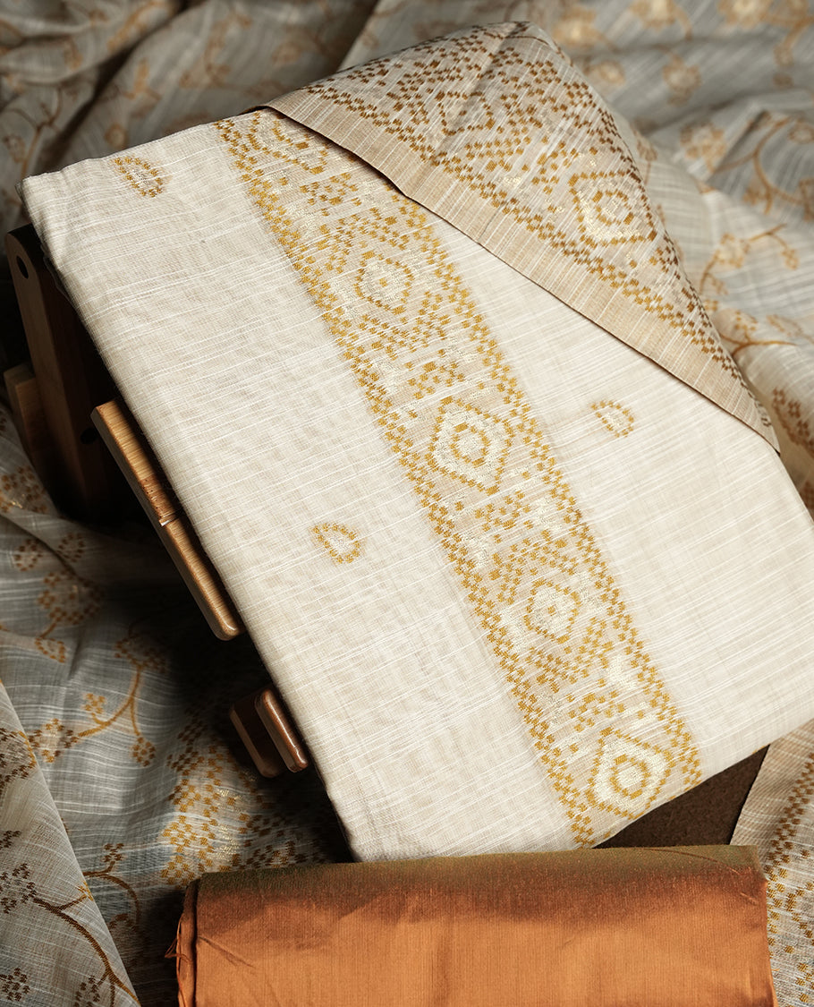 Cream colour churidhar material featuring Gold colour thread embroidery on the front panel, floral thread pattern dupatta with elegant border, and matching plain bottom.