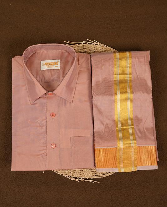 Copper colour Aswin’s wedding set featuring a refined silk shirt and matching dhoti with gold zari detailing, crafted for timeless elegance and perfect for traditional weddings and festive occasions.
