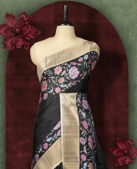 Black colour Semi Tussar Silk saree with vibrant digital floral printed body and elegant Kandha work border & Paired with a matching blouse.