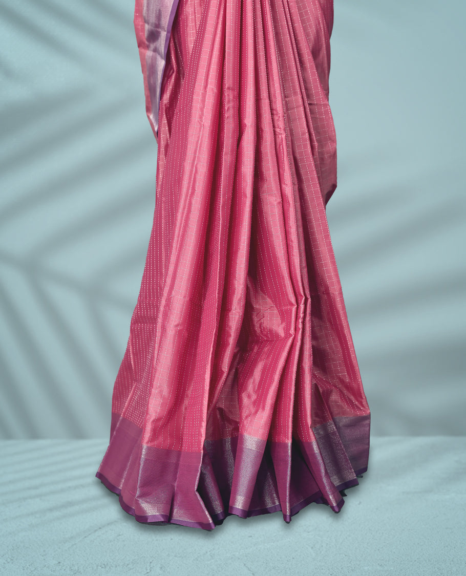 Rose pink Colour semi silk saree features delicate silver thread checks all over, paired with a Plum Colour zari border and a matching blouse