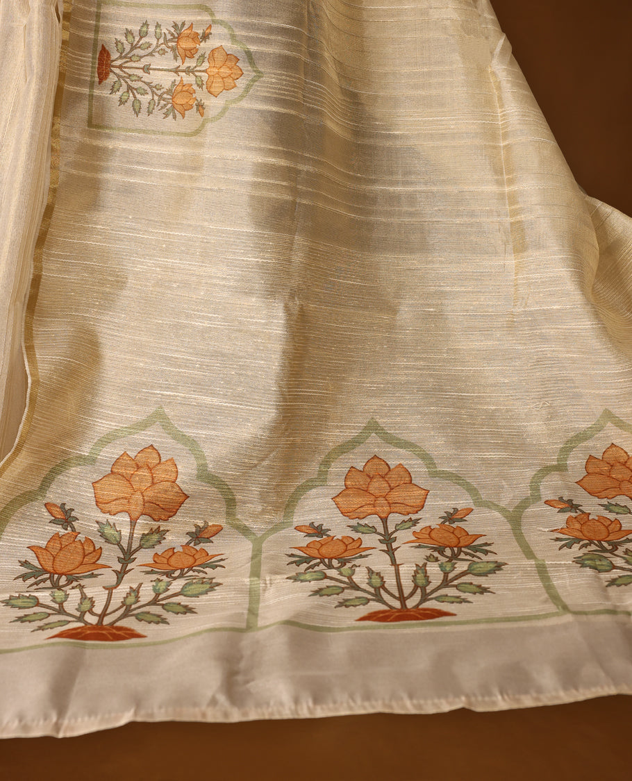 Ethereal offwhite colour organza Kerala saree with elegant orange floral embroidery and a subtle zari-style border, Lightweight and graceful, paired with a matching blouse, Perfect for festive and elegant occasions.