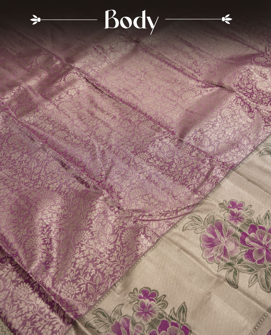 Purple colour and Antique silver Zari Tissue Brocade Saree features intricate floral Motifs on body and pastel green colour fancy border & pallu with purple floral patterns, paired with matching blouse