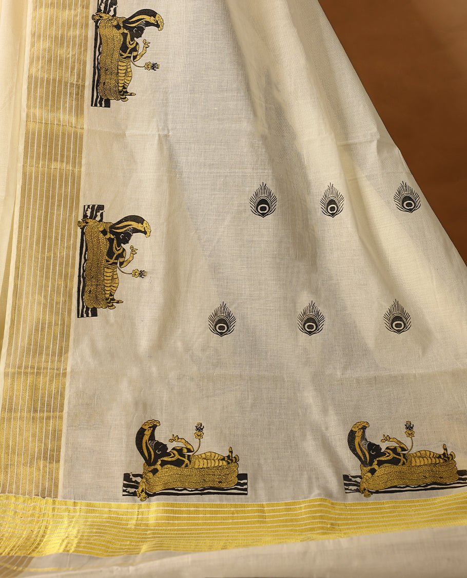 Elegant off white colour cotton Kerala saree featuring peacock feather prints on body, Gold  kasavu border with  Lord Vishnu, offering a classic and graceful look, paired with a matching blouse.