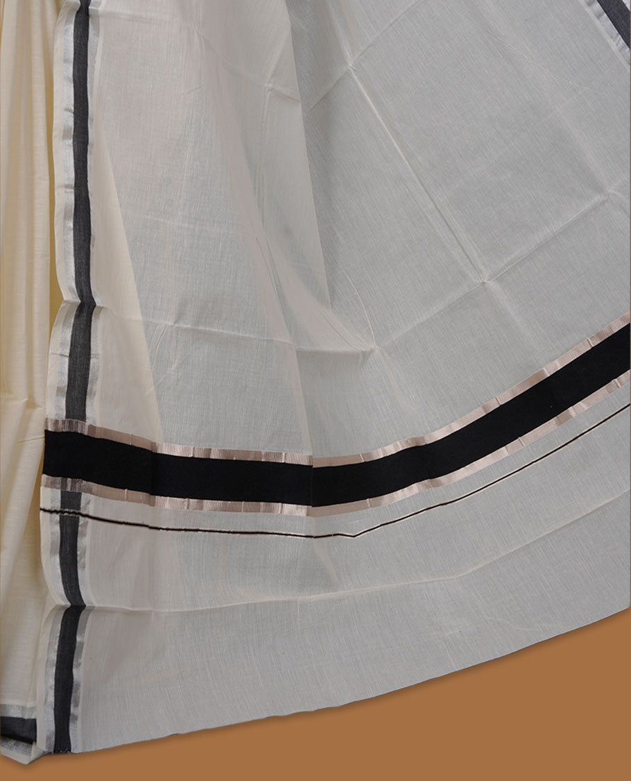 Off-white colour cotton Kerala saree with a subtle silver and black kasavu border, featuring a clean plain body, paired with a matching blouse.