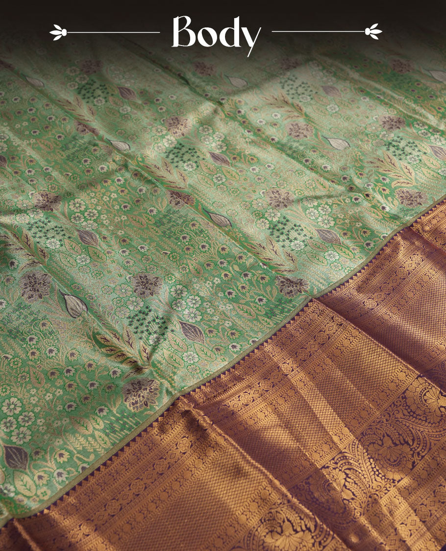 Aqua green colour and Antique gold Zari Tissue Brocade Saree features intricate floral Motifs on body and rich violet colour border & pallu with traditional patterns paired with matching blouse