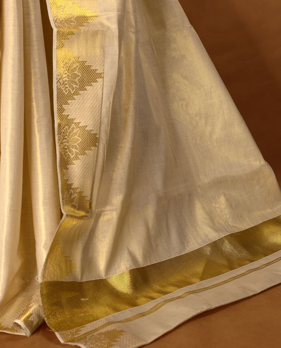 Gold colour Tissue Kerala saree featuring Plain body and a beautifully woven Gold Kasavu border with floral & Temple Motifs, paired with a matching blouse perfect for festive occasions.