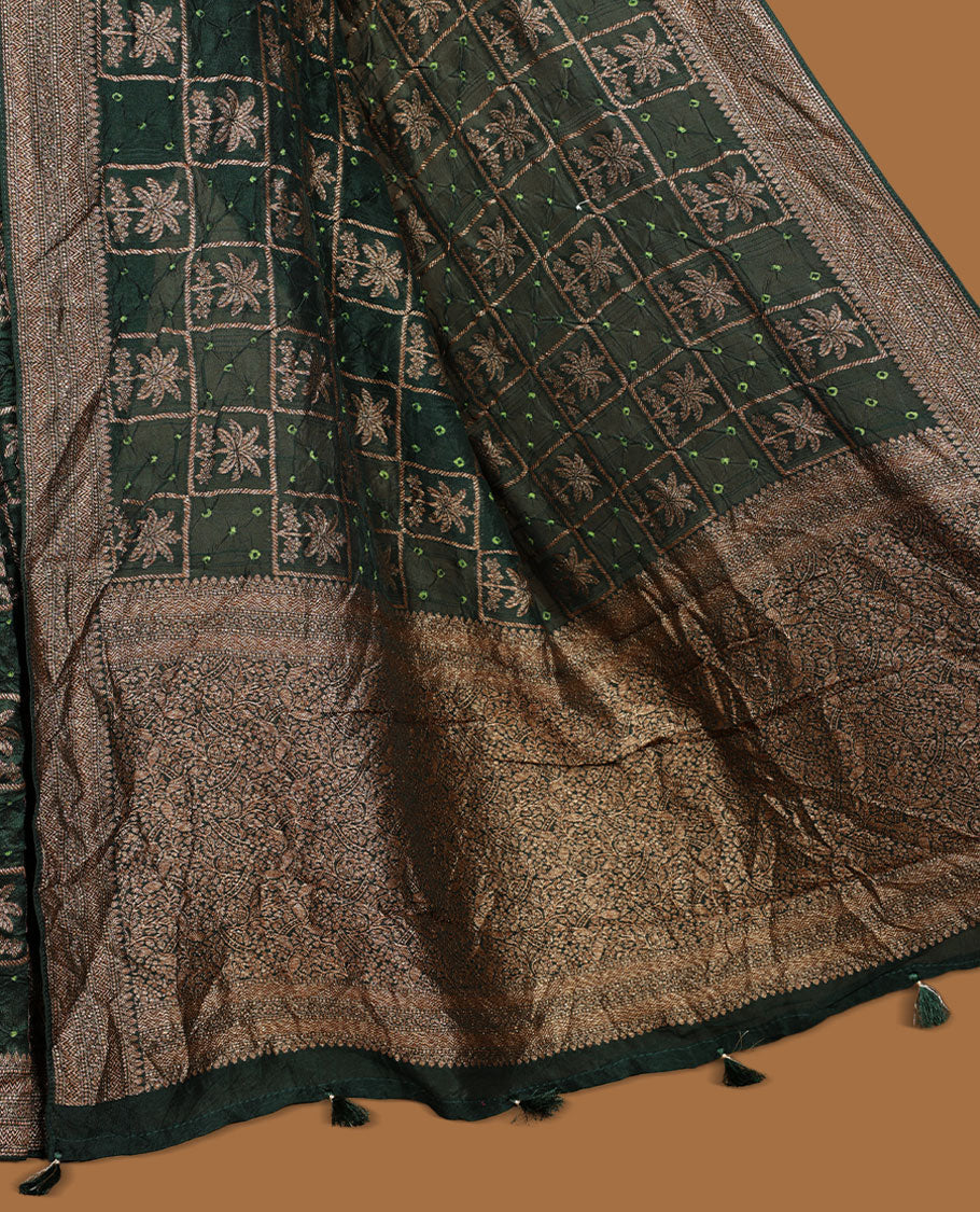 Deep Green colour Banarasi Bandhani silk saree featuring with intricate Banarasi motifs on body, complemented by antique zari woven border and grand pallu, paired with matching  blouse
