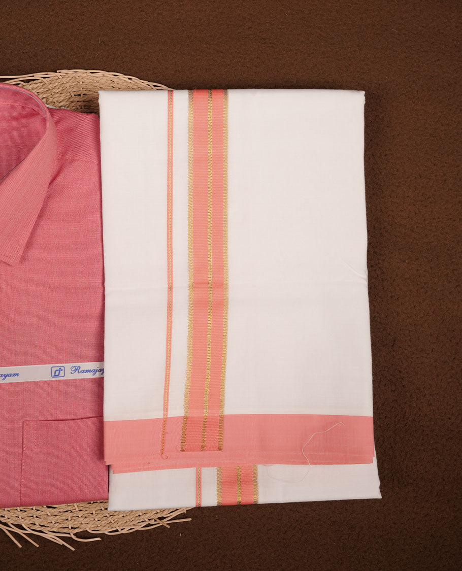 Georgia peach Colour shirt paired with a matching dhoti, finished with a peach and gold border.