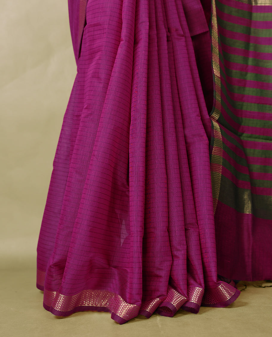 Deep Magenta colour chanderi cotton saree with fine striped body, mangalgiri border, grand pallu featuring Green and gold zari stripes, with matching blouse.