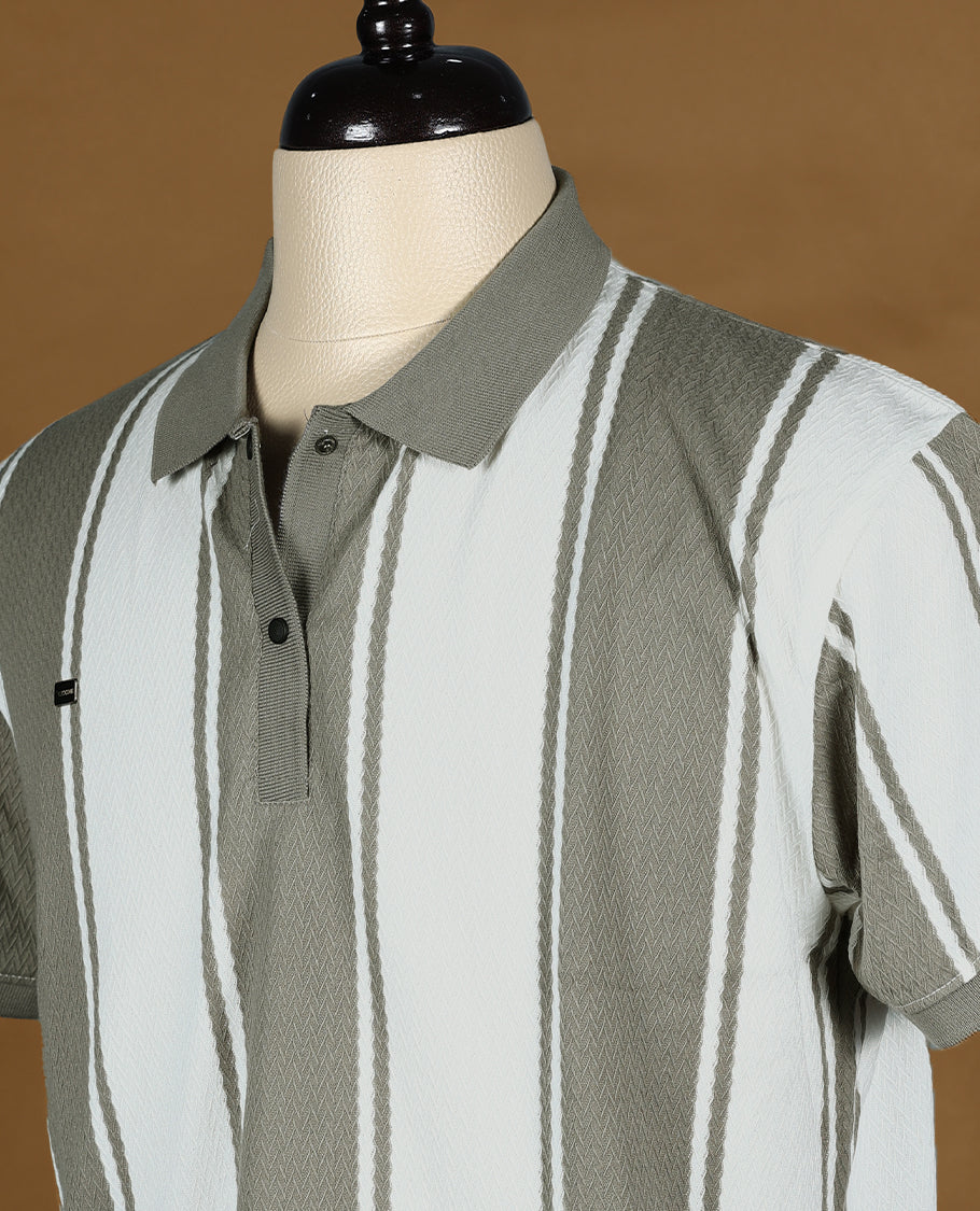 Grey and white striped men’s polo T shirt featuring a classic collar with button placket, short sleeves, and a regular fit crafted from soft, breathable fabric for everyday comfort and style