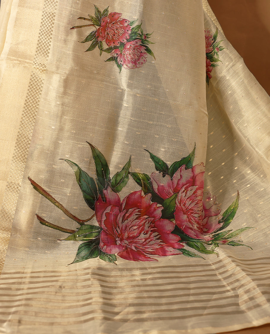 Light gold colour Organza Kerala saree with a sheer, smooth body and soft golden sheen. Accented with a fine zari border and Bold floral motifs on Pallu, Comes paired with a coordinated matching blouse.