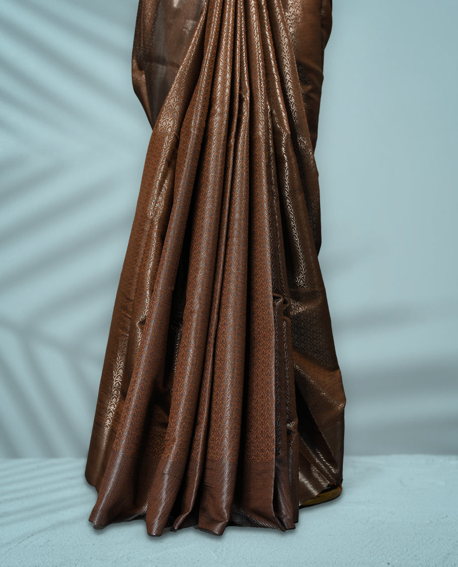 Deep Brown Colour semi silk saree featuring an intricate Zari  motif weave across the body, paired with a zari worked border with matching blouse.
