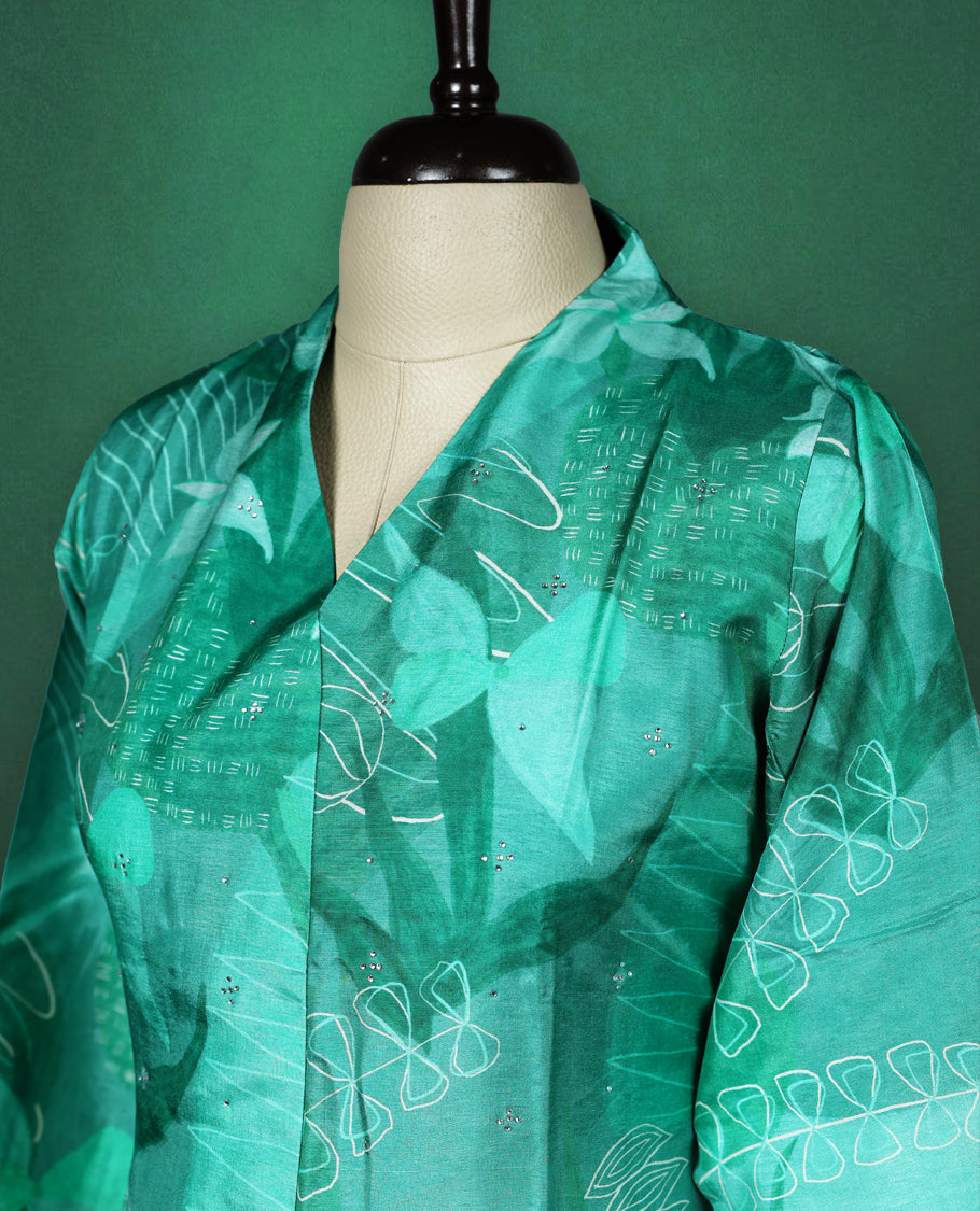 Teal green straight cut kurti with tonal abstract prints and delicate stone work on the body, featuring a V neck with notched collar and elbow length sleeves with button tabs.
