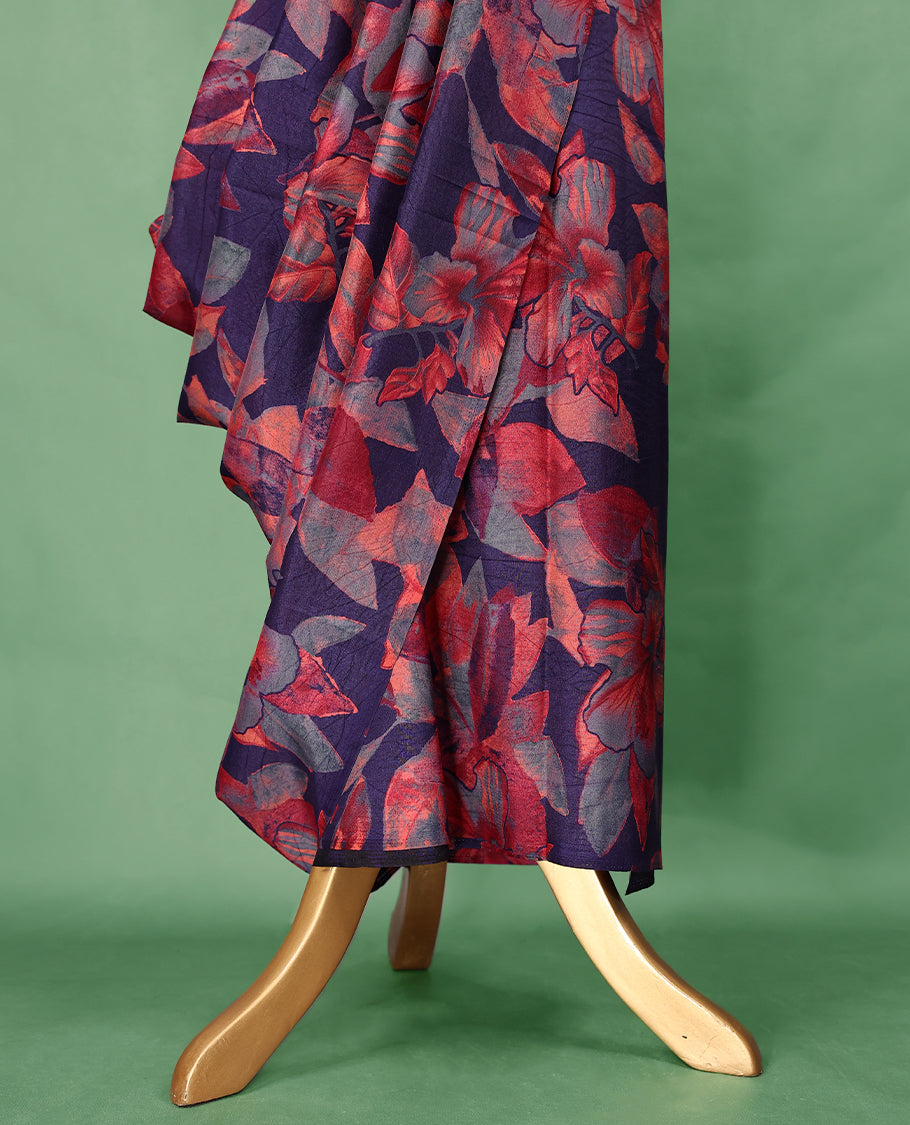 Deep purple colour Manipuri saree features a body with bold red and grey floral prints, a minimal border, and comes with a matching blouse.