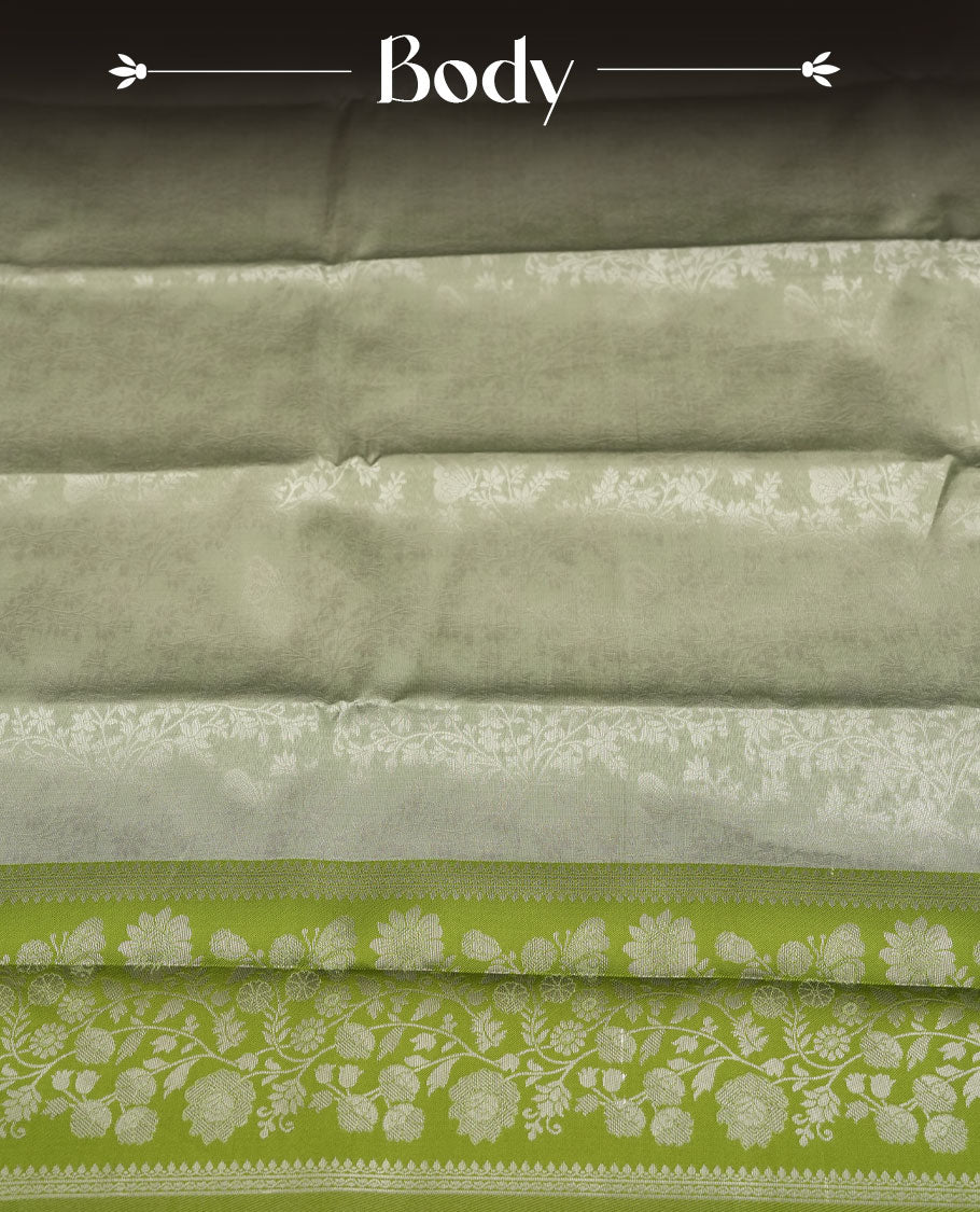 Pistachio Green colour Semi Silk Saree with Allover Subtle Floral Self-Weave on the Body, Contrasting Light Lime Zari Woven Pallu and Border Featuring Intricate Geometric Motifs and Tassels, Paired with Coordinated Blouse Piece