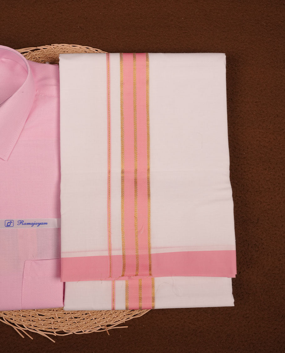Light Pink Colour shirt paired with a matching dhoti, finished with a Pink and gold border.