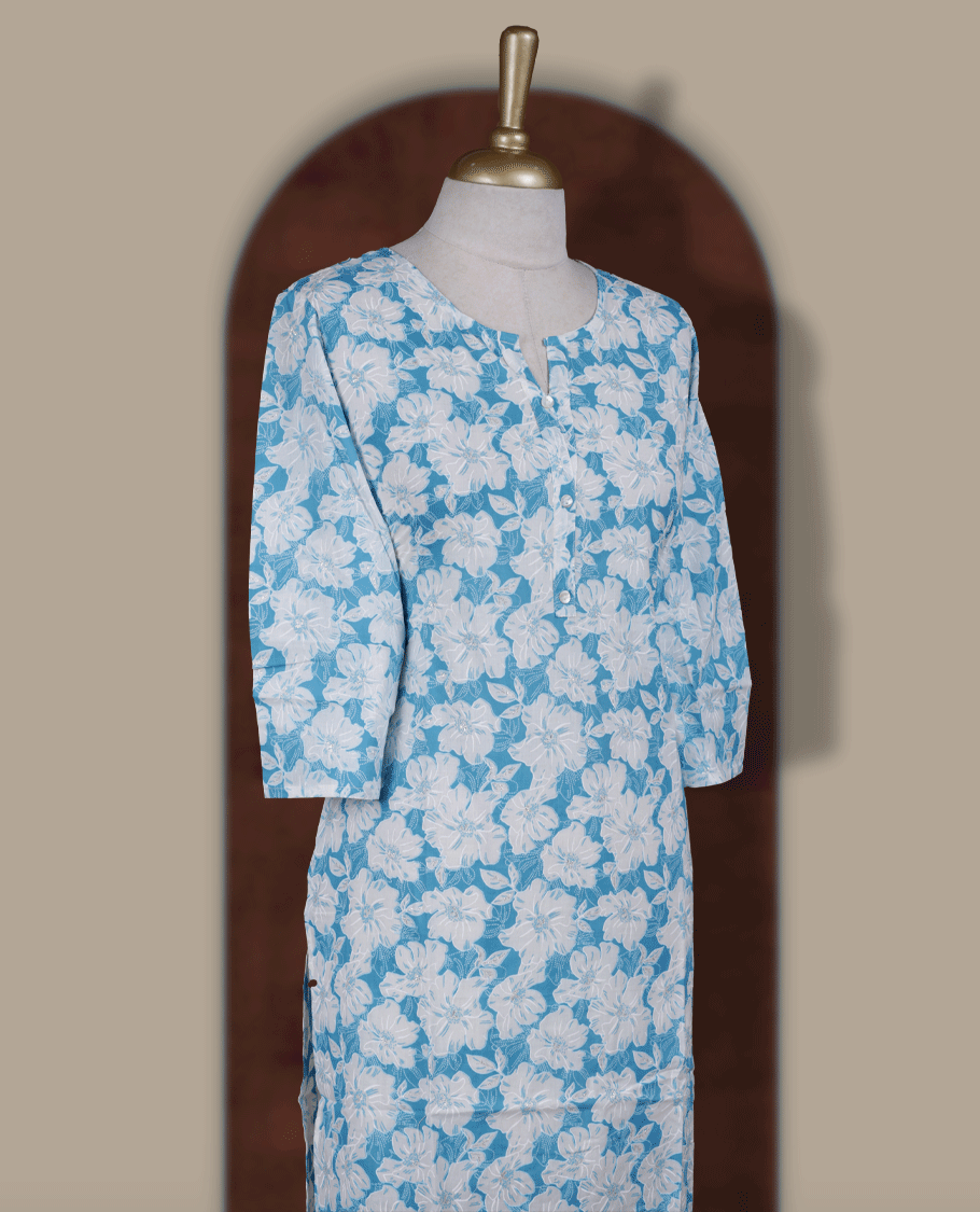 Sky blue colour kurthi featuring with white floral prints all over & Designed with a round neckline with V notch, button placket, and 3/4 sleeves.