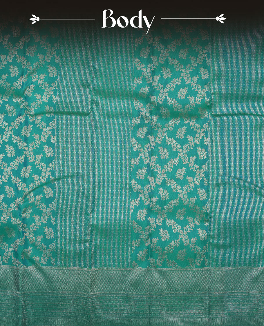 Peacock blue colour Kanchipuram pattern Manthrakodi saree with double pattern zari jacquard body, antique zari floral design, vertical oosi lines with diamond motifs, elegant zari border, and self jacquard blouse piece.