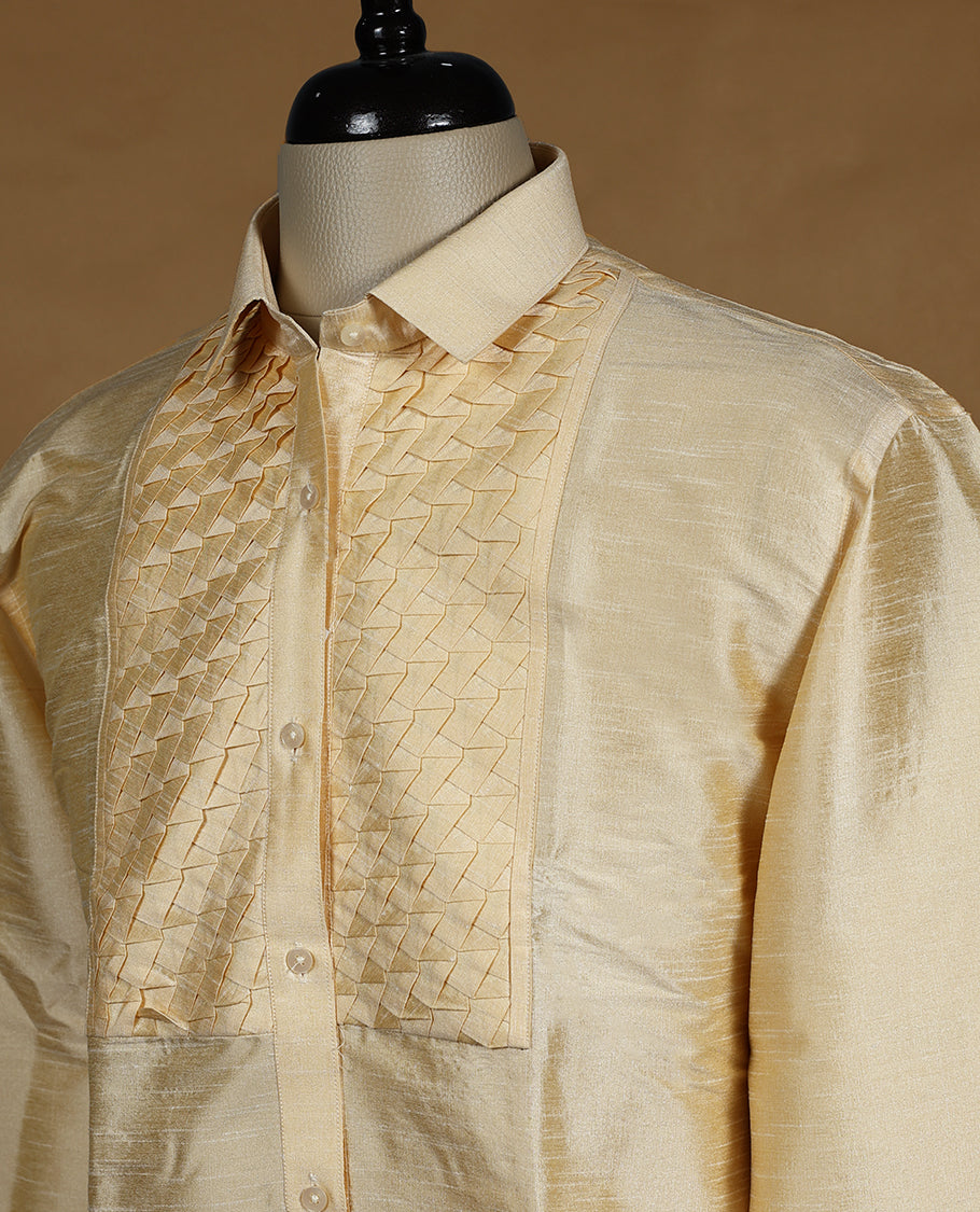 Cream ivory DH men's semi silk wedding shirt with a glossy finish, featuring intricate diamond jacquard pleats on the front panel, full sleeves, classic collar, and a chest pocket.