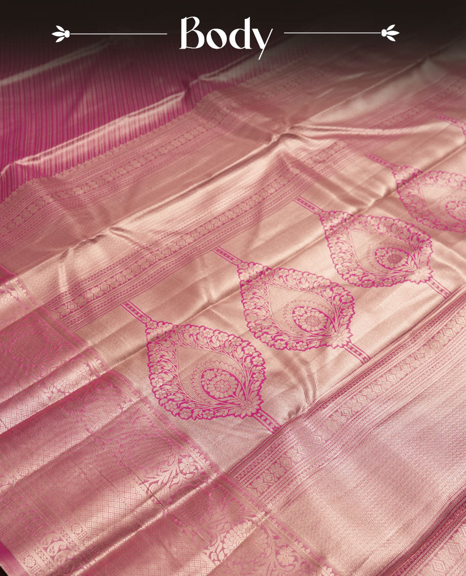 Magenta colour and gold zari Tissue Brocade Saree features intricate line Motifs on body and a traditional border & pallu, paired with matching blouse