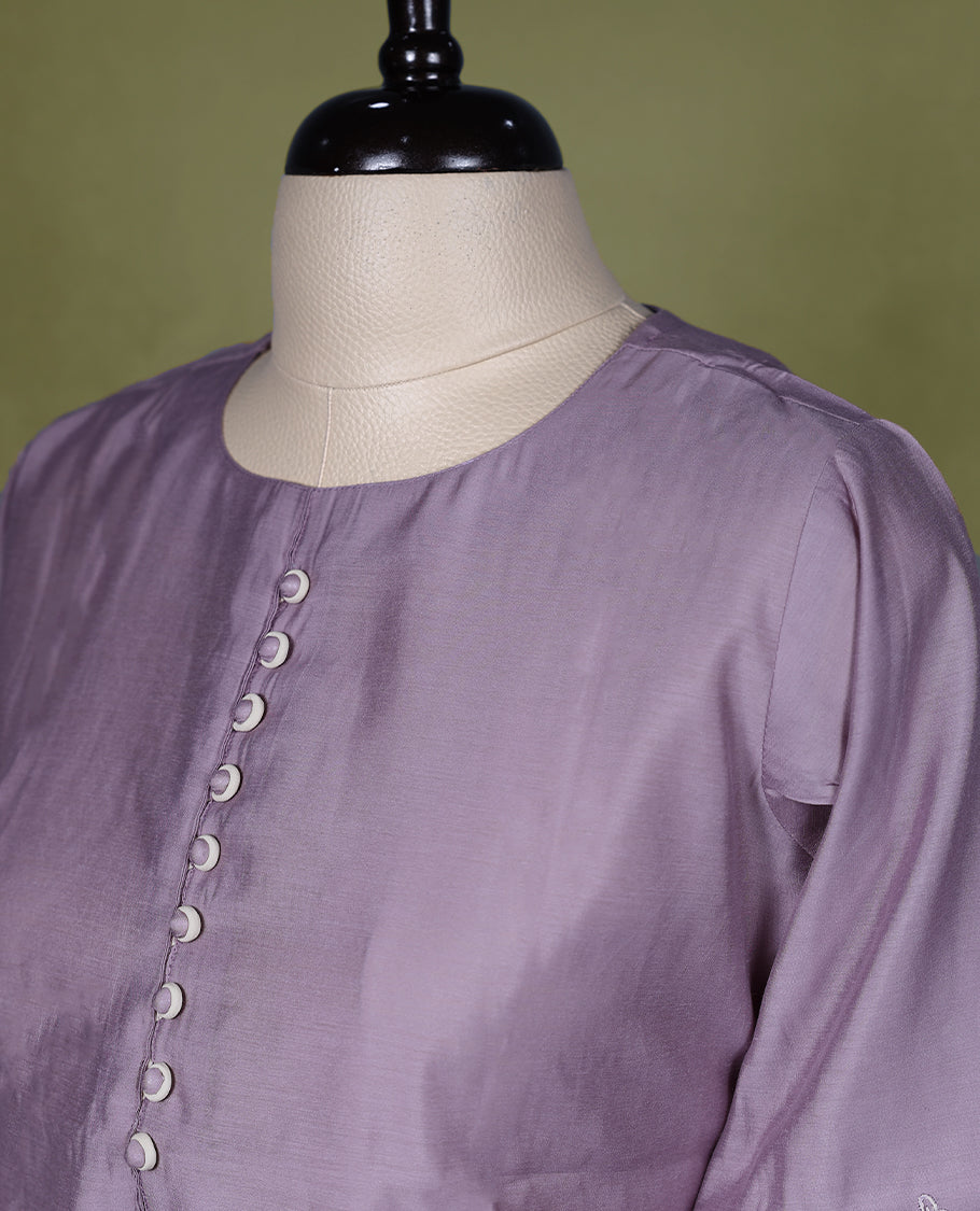 Lilac coloured round neck Readymade kurti for women, featuring 3/4 sleeves with embroidery work.