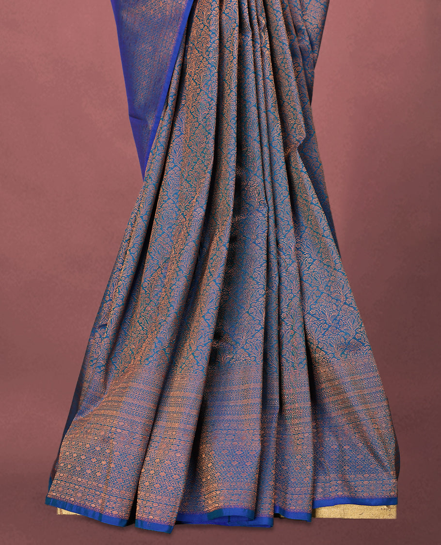 Blue colour Kancheepuram saree featuring an antique zari brocade body, complemented by a traditional border and a matching blouse.