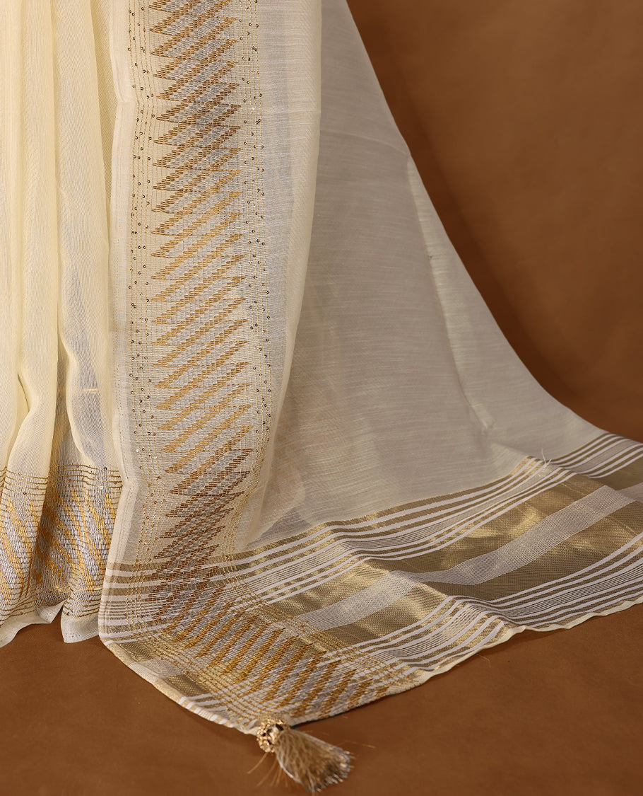 Ivory colour organza Kerala saree with golden zari detailing, featuring diagonal woven patterns on the pallu and border. Lightweight and elegant, it comes with a matching blouse piece for festive charm.