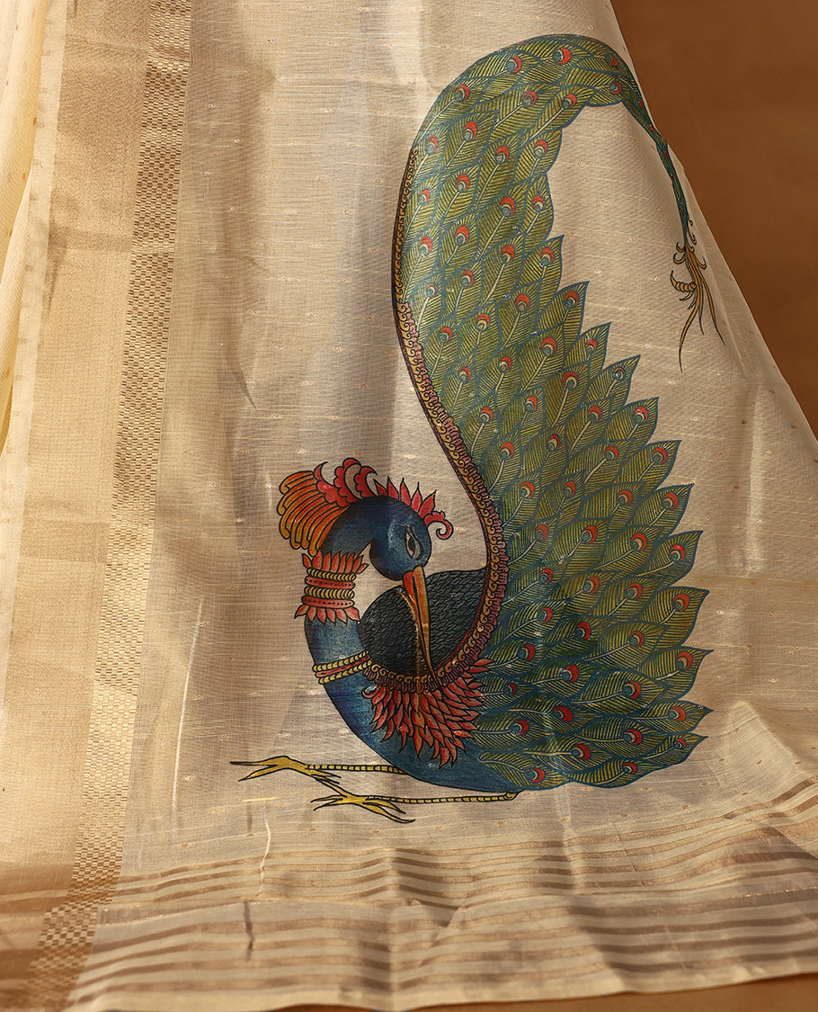 Light gold colour Organza Kerala saree featuring  a sheer, smooth body, Gold Kasavu border, Peacock printed pallu, Comes paired with a coordinated matching blouse.