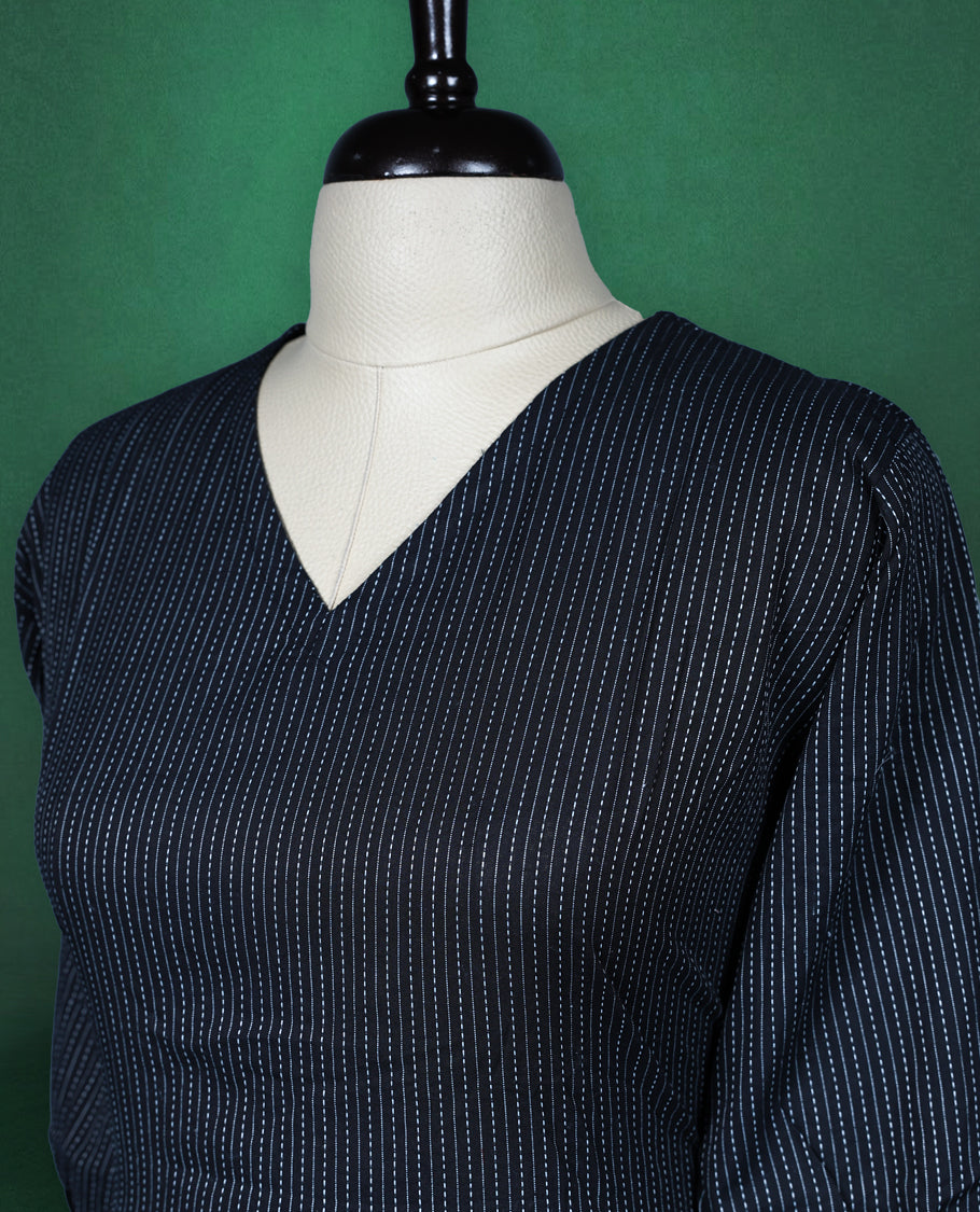 Black colour dress featuring subtle pinstripes, a V neckline, and three quarter sleeves, finished with a gathered waist and ruffled hem, chic and comfortable choice for casual outings.