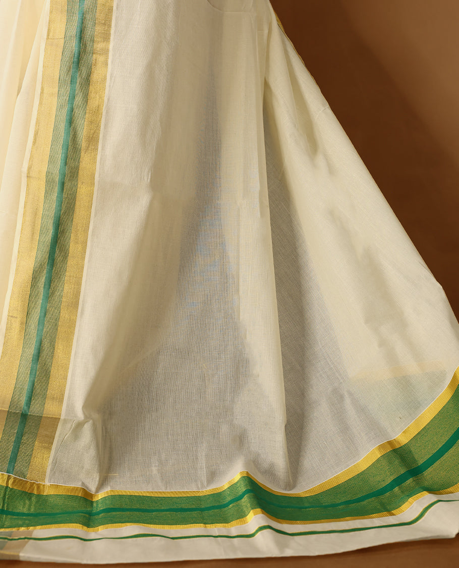 Elegant off white colour cotton Kerala saree featuring Plain body, Green colour & golden zari kasavu border offering a classic and graceful look, paired with a matching blouse.