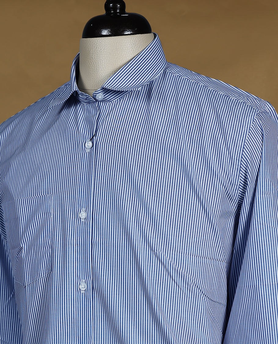 Sky blue Peter Eglend men's formal shirt in a soft cotton blend, featuring fine white vertical pinstripes, full sleeves with contrast cuffs, classic collar, and a chest pocket.