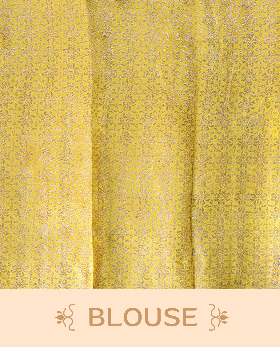 Pastel Yellow Semi tissue saree featuring a brocade body, self coloured zari border, and a matching self coloured blouse.
