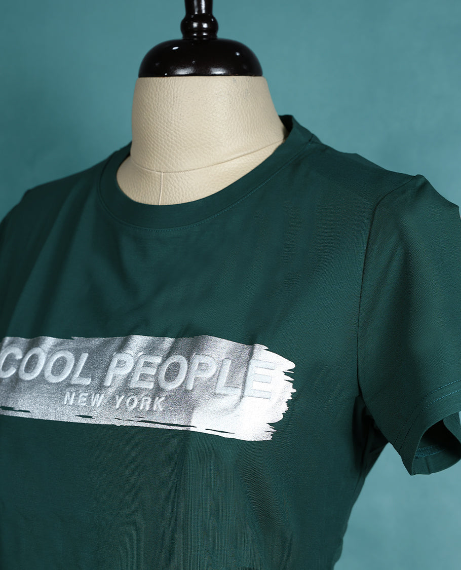 Dark green colour T shirt featuring short sleeves, a round neck, and a silver metallic print on the chest for a trendy casual vibe