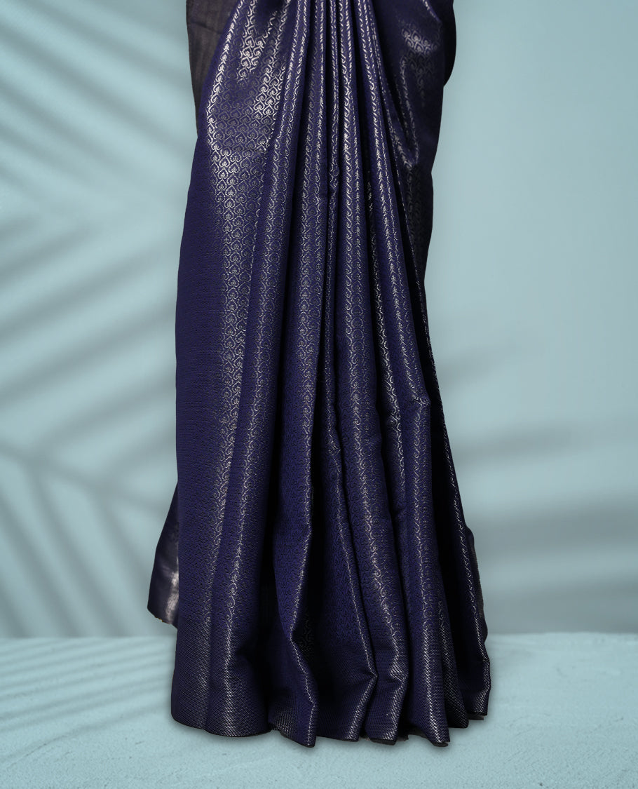 Navy Blue Colour semi silk saree featuring an intricate Zari  motif weave across the body, paired with a zari worked border with matching blouse.