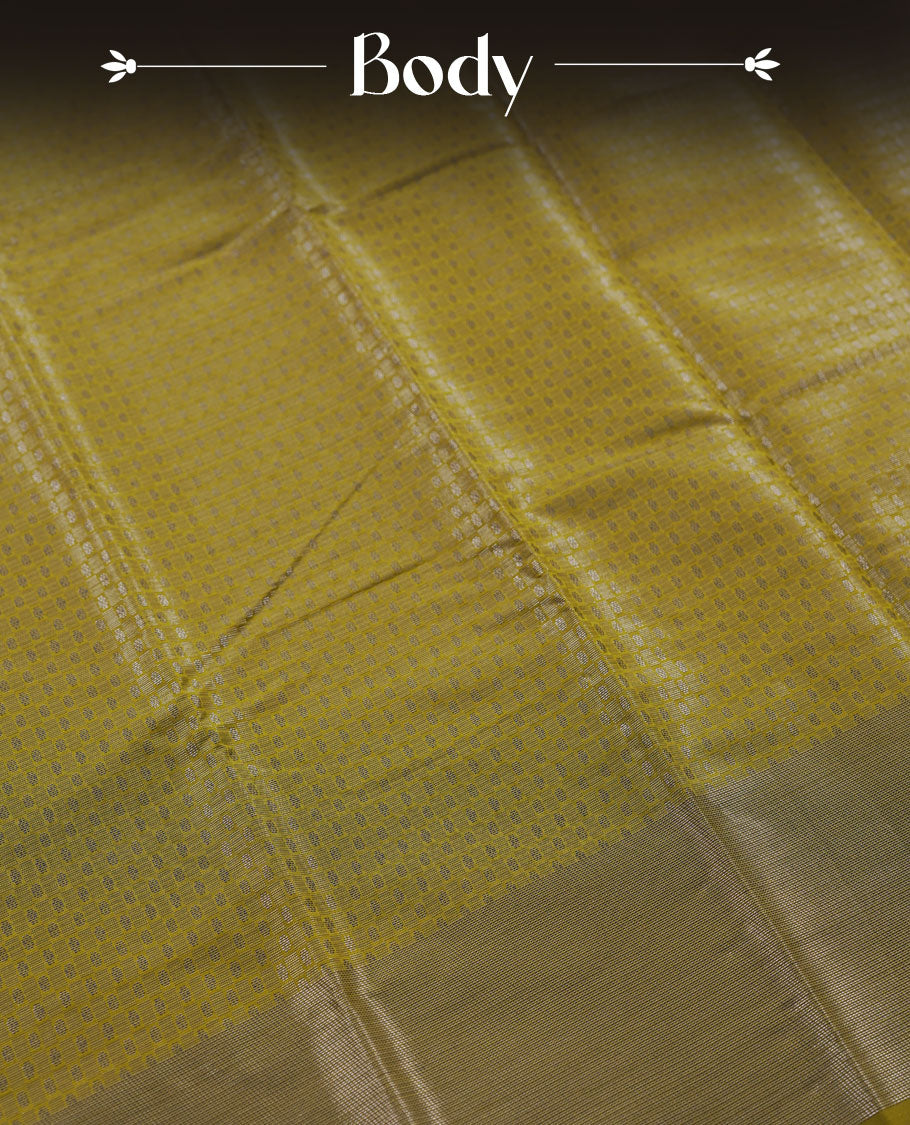 Military olive colour semi silk saree featuring neem zari Brocade Pattern all over the body, complemented by a Self Colour woven border with detailing, Pallu & blouse.