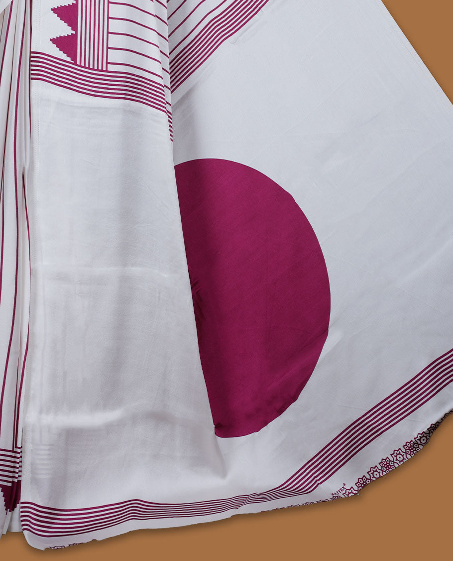 White colour semi modal saree featuring wine berry colour geometric borders and fine stripe detailing, finished with an oversized circular motif on the pallu, paired with a matching printed blouse.