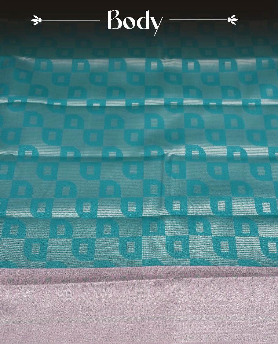 Teal Green colour Semi Silk Saree with Self-Checked Geometric Patterns on the Body, Contrasting Ice Silver Zari Woven Pallu and Border Featuring Intricate Paisley-Floral Motifs and Tassels, Paired with Coordinated Blouse Piece