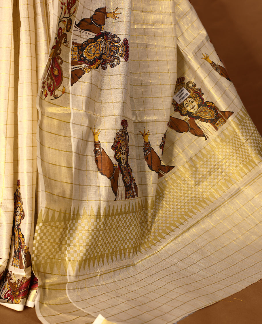 Light Gold colour Tissue Kerala saree featuring Kerala traditioal Prints on checked body and a beautifully woven Gold Kasavu border, paired with a matching blouse perfect for festive occasions.